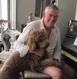 Man at piano with dog testimonial